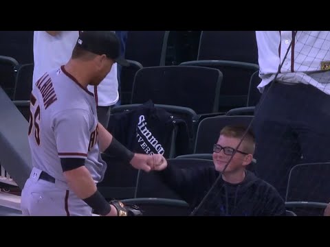 RESPECT! Kole Calhoun gives kid the rock after awesome catch!