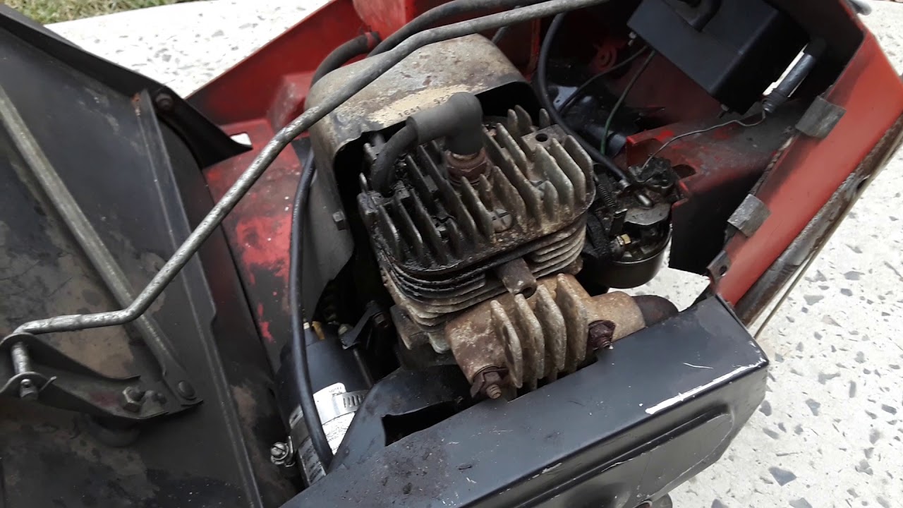 Tecumseh 2 cycle AH600 3 hp engine powering the snowchamp single stage