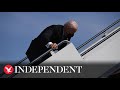 Biden falls three times up steps to Air Force One