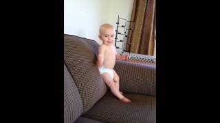 Excited Baby Falls Off Couch Head First