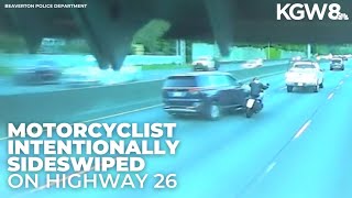 Minivan runs motorcyclist off Highway 26 in apparent road rage incident