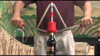 The grape and granary show you how to use a hand corker for corking
wine bottles. twin lever deluxe adjustable italian corker. cork depth
into bottle ca...