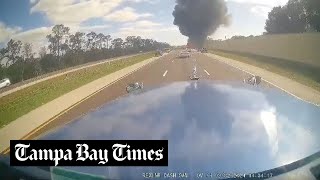 Truck’s dashcam video shows jet crashing on busy Florida highway before big explosion