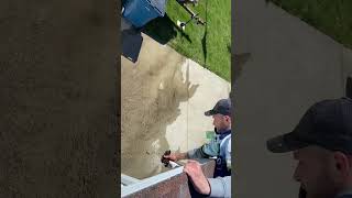 Cleaning a clogged down spout | Green Pro Services | Kankakee County Gutter Cleaning Service