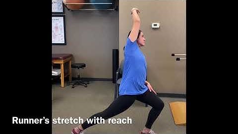 Standing Hip Flexor Stretch With Overhead Reach - Omaha Physical Therapy Institute