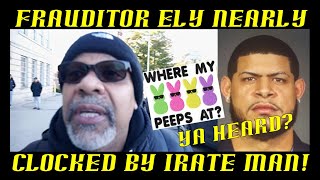 Frauditor Ely Nearly Clocked by Irate Man but Saved by Cops!