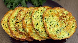 Just grate 1 zucchini and pop it in the oven! Better than pizza! An easy zucchini recipe!