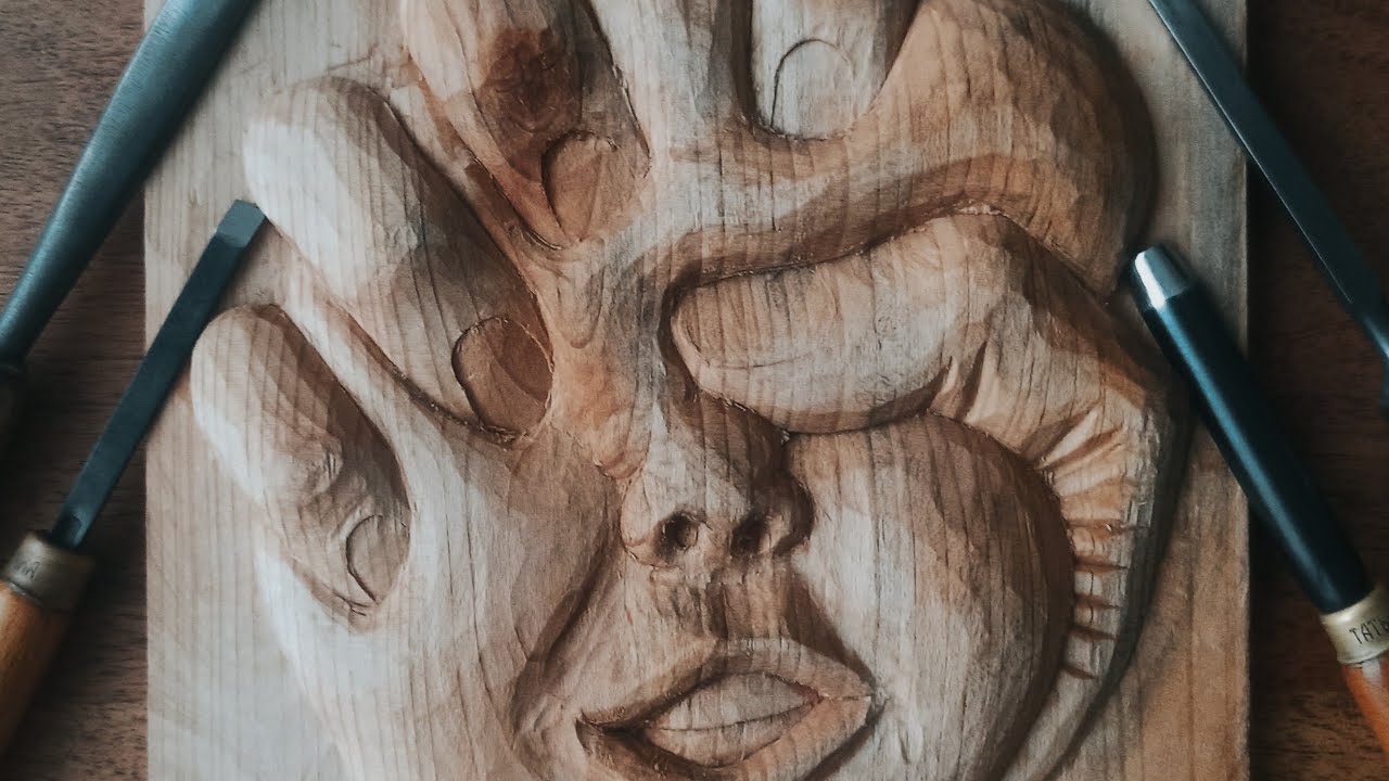 Face Beneath the Hand | Wood Carving