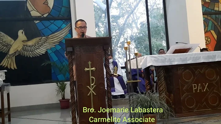 With Fr. Sheldon Tabile, O.Carm. giving the homily...