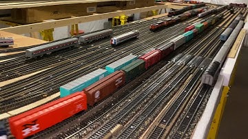 Trains threading their way through (eventually hidden) staging tracks