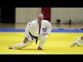 Black belt Putin shows off judo moves with Olympic athletes