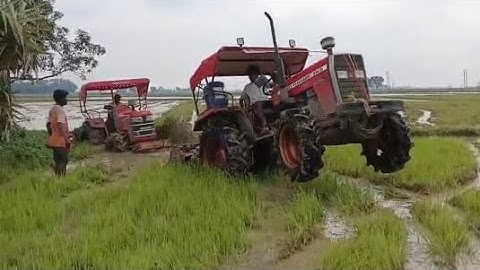 Mahindra yuvo 585 di deep mud stuck 😱 😱 Messy dynatrac 254 di help 🔥 💪 🚜 #tractor video