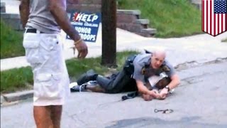 Civilian hero risks life to save cop fighting suspect resisting arrest in Cincinnati - TomoNews