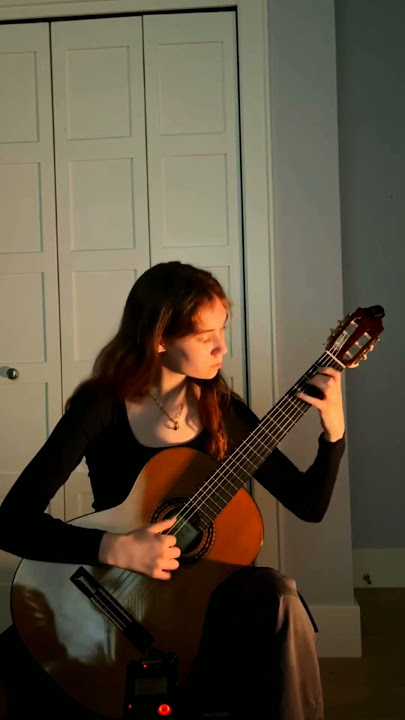 She's a Guitar magician 🤩 #guitar #guitarist #guitarplayer #guitarperformance #guitarcraft #shorts