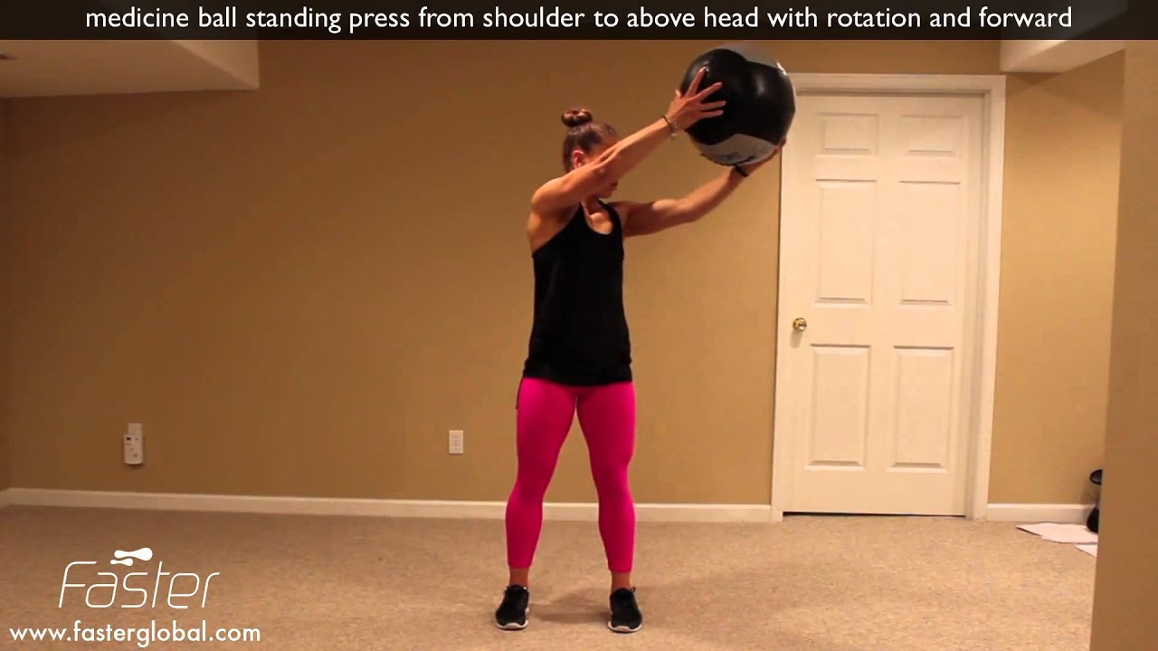 medicine ball standing press from shoulder to above head with rotation ...