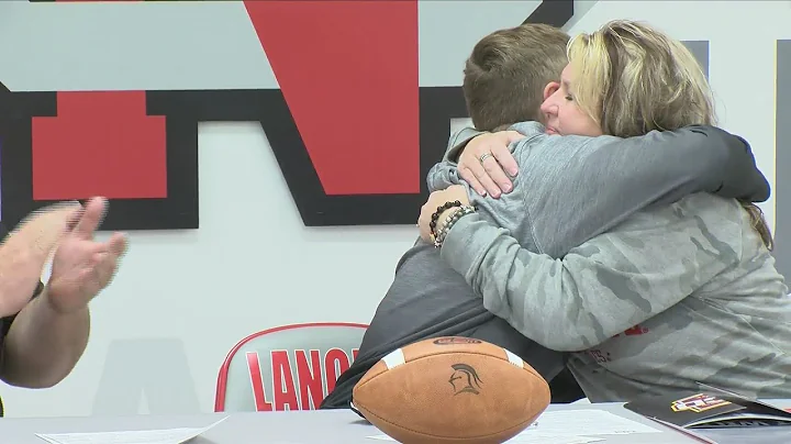 North Scott Football player Joey Petersen signs wi...