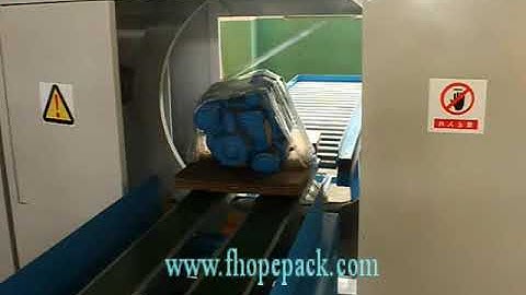 horizontal stretch wrapper for motor packing on tray