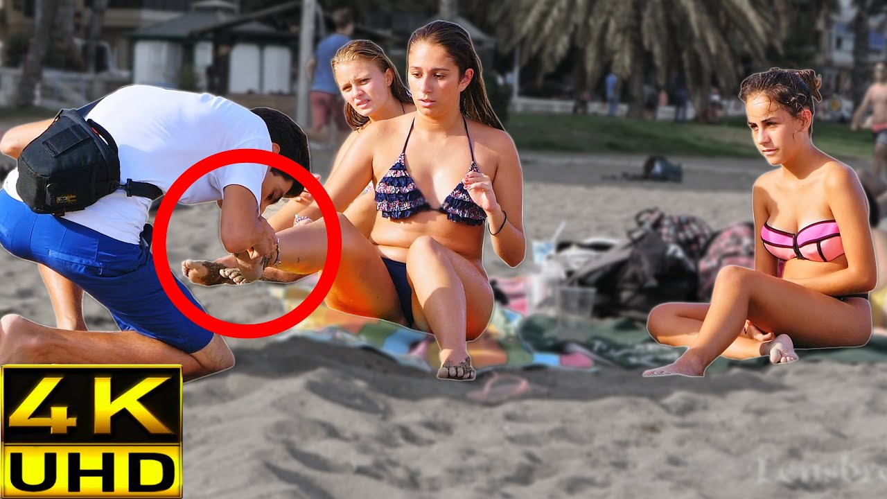 Prank! Kissing girls feet on the beach 1 (UNCUT) photo