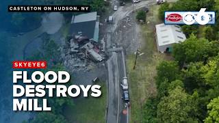 Flood waters cause old mill to collapse