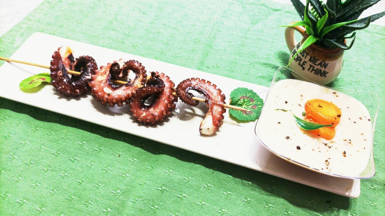 Tentacoli di Polpo arrostiti e laccati al Miele con Crema di Fagioli Cannellini