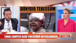 Yaralı halde kameralara gülümseyen Suriyeli çocuk duygulandırdı