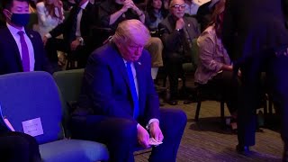 Trump donates wad of $20s at Nevada church event