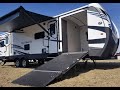 Дом на колесах - прицеп с большой кладовкой Keystone Outback 324CG. Показана работа всех механизмов