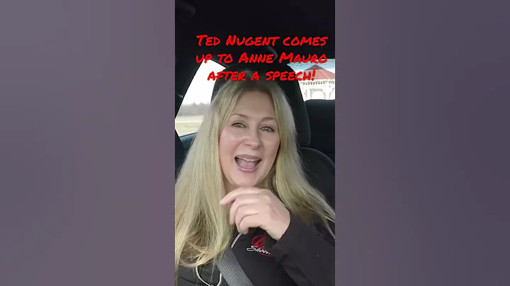 Ted Nugent comes up to Anne Mauro after a speech