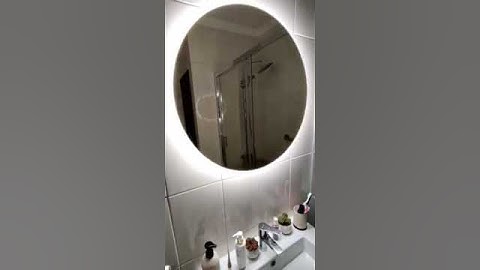Mirror with proximity sensor.