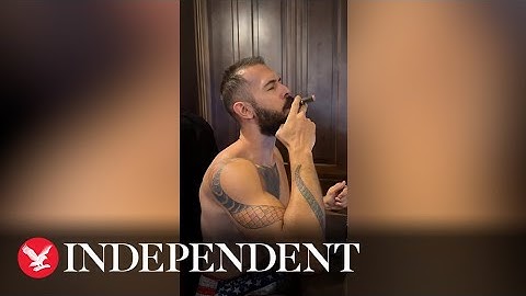 Andrew Tate shares clip smoking cigar and listening to music during house arrest
