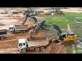 Super Operators Excavator Clearing Soils Digging Into Dump Trucks Moving Awesome Powerfully