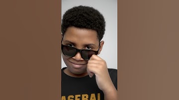 Thumbnail of bella canvas t shirt video featuring a cheerful boy posing with a skateboard in a studio 7901v