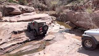 Suzuki Samurai stream crossing in Moab