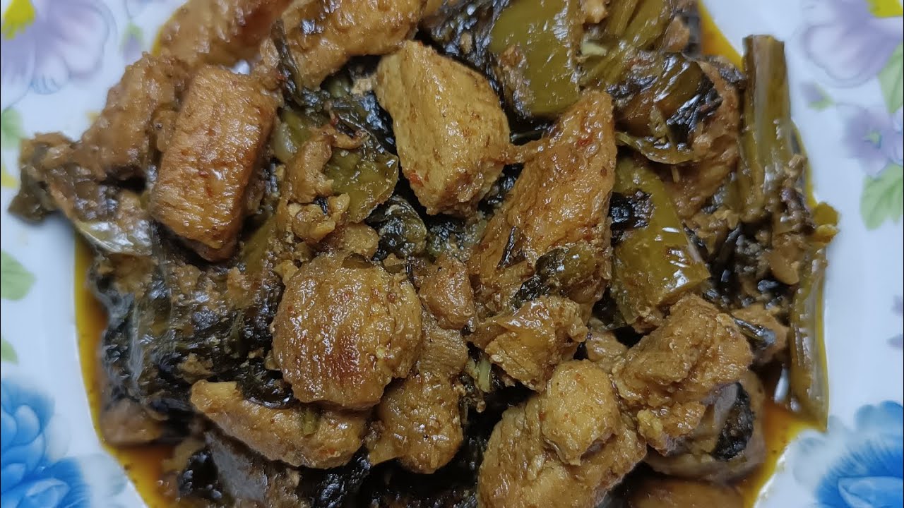 ဝက်သားနဲ့မုန်ညင်းချဉ်ဟင်းလေးပါ။pork and green mustard picked curry.