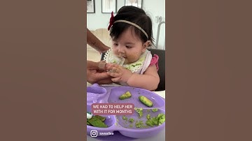 Maya drinks from an open cup at 5.5months