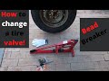 How to change a tire valve using a motorcycle bead breaker.