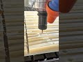 CNC router mills precise grooves into plastic material blocks