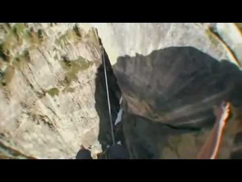 Dean Potter walks a tightrope in Yosemite, at 7,800feet..flv