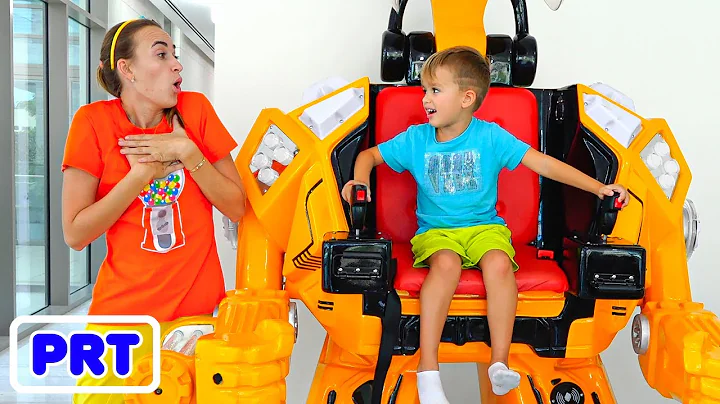 Vlad e Niki brincam com um brinquedo de carro robô