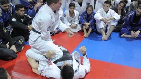 Rafa Mendes showing worm guard / lapel sweep to back take