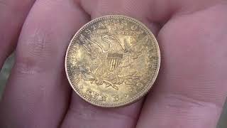 GOLD COIN FOUND IN OLD SWIMMING HOLE
