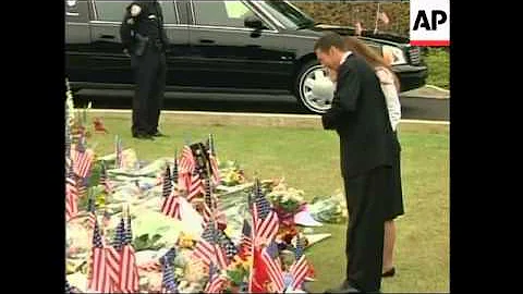 Nancy Reagan arrives to see coffin depart for libr...