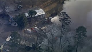 Gwinnett County fire crews battle flames at mobile home park