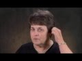 Listen to a patient describe her experience with hearing aids when she first got them.