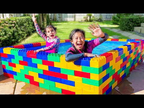 Jannie and Ellie Learn to Swim in the Kids Lego Pool and Plays with Fun Water Toys