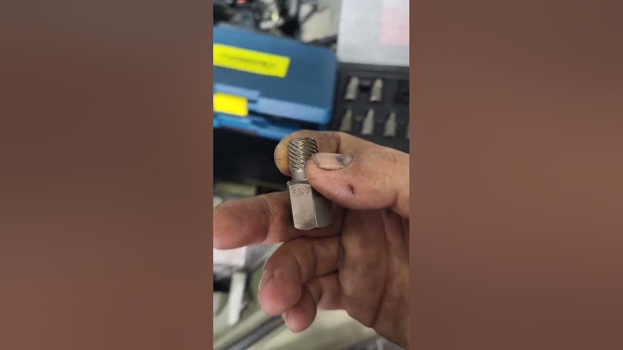 here is how to remove a rounded bolt in a tight space ( cylinder head