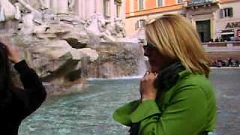 My Mom throwing money in the trevi fountain