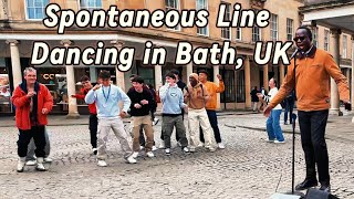 Spontaneous Line Dancing in Bath, England to O'rael singing 'Heard It Through The Grapevine'