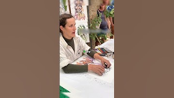 Nữ nghệ sĩ này vẽ bằng cả 2 tay mà không cần nhìn vào giấy 😲