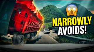 Truck narrowly avoids overturning on mountain road in Guizhou, China